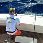 Brett Peeples aboard the 'Full Time' fighting a blue marlin down in the Dominican Republic.