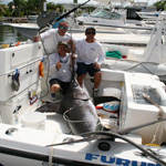 Capt. Dean Panos with a Swordfish caught on Baitmasters squid