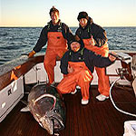 Bart, Mike and Red with a 350lb Bluefin Tuna, caught off Morehead City, NC 12-09-06, aboard 'Clueless' using a Baitmasters Horse Ballyhoo