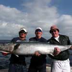 Captain Glenn Morgan aboard the 'Carpe Momentum' with an 108 lb wahoo