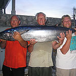 Larry Reed and Crew show off their 81 lb. Wahoo caught with a Baitmasters double hook ballyhoo!